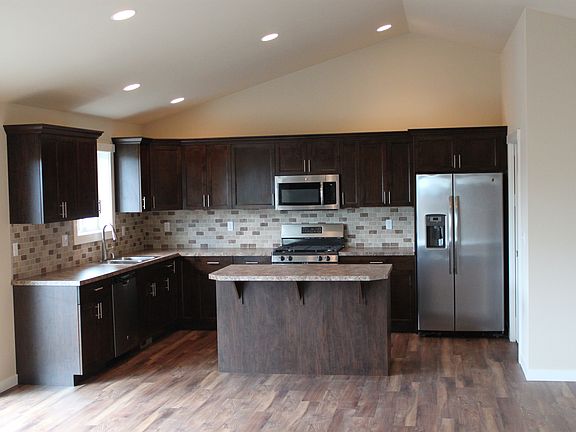 Kitchen with vaulted ceiling