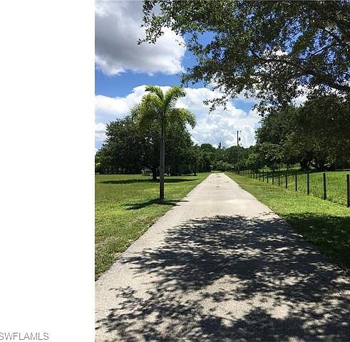 Looking East down driveway.
