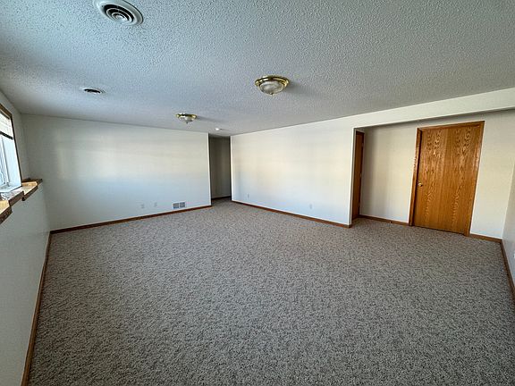 Lower level family room with fresh bright paint!