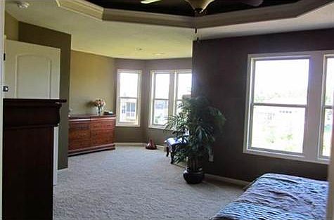 Comfortable sitting area in master bedroom