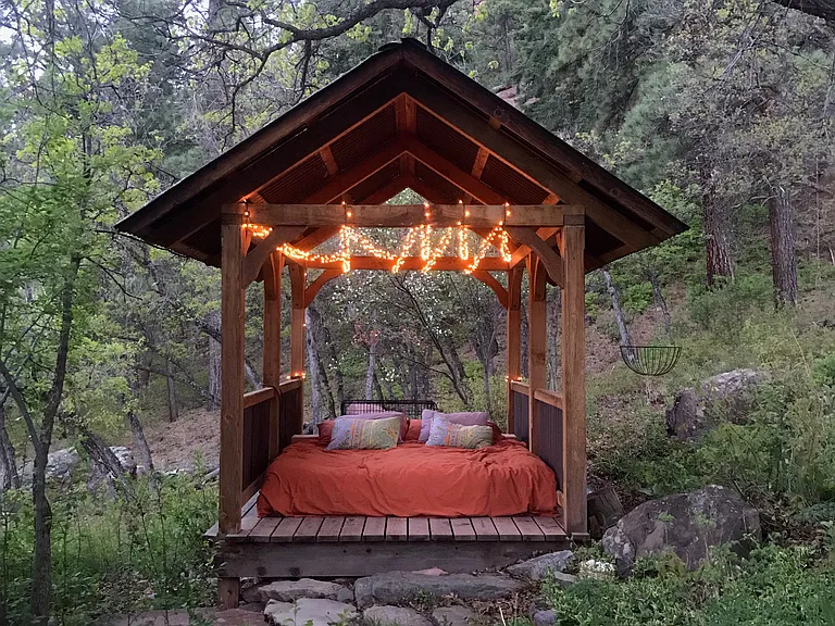 Gazebo set up as sleeping area for summer guests, about 20 steps from back deck
