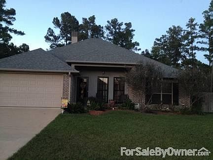 Front view from street : Landscaped, two car garage, in cul-de-sac.