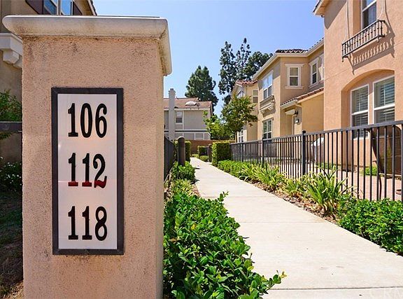 Seen up close, these numbers are illuminated at night for ease of visitors.  The walkways and post lighting are the responsibility of the Homeowners Association.