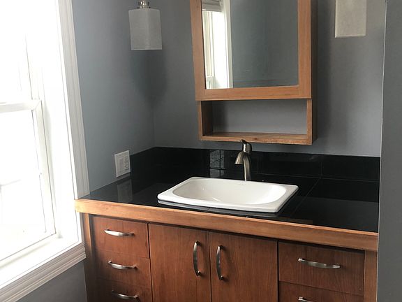 Matching vanity and mirror. 
