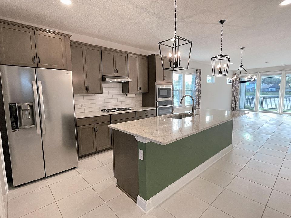 Granite countertops, soft close cabinets, gas cooktop