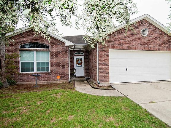 12366 Green Ridge Drive, Willis in Lake Conroe Hills has convenient boat access, community  center and easy access to FM 1097, FM 830 and IH 45