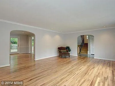 Living Room - view into Dining Room (left) and Foyer (right)