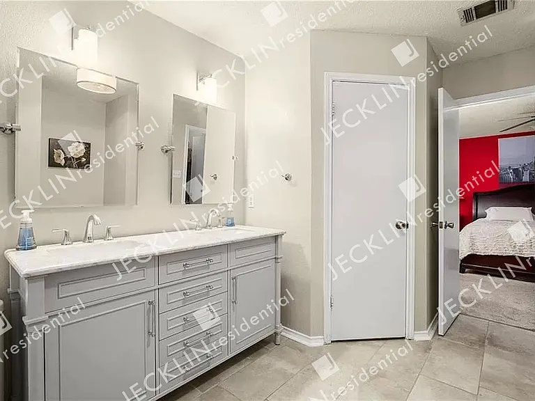13805 Lothian Dr — Photo 20