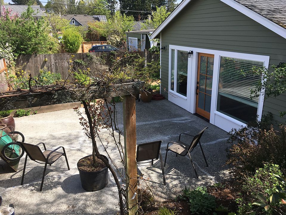 View of cottage entrance and small patio that goes with the cottage