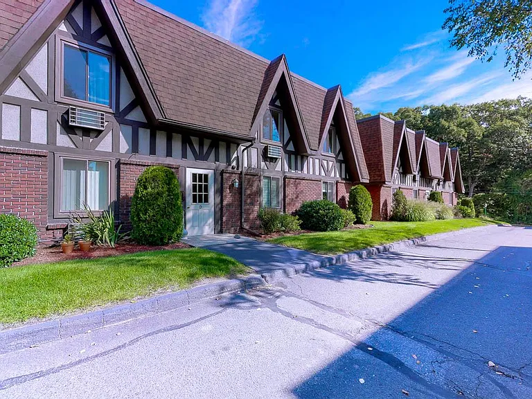 English Tudor curb appeal with distinctive timber and stucco accents.