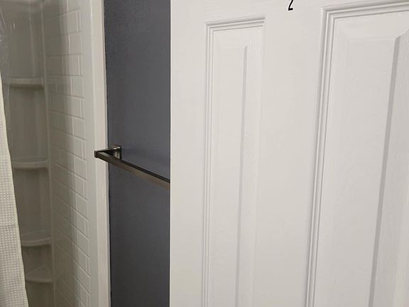 Room 2's private full bath.