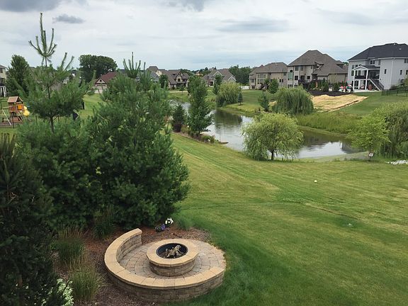 Deck View of Fire Pit & Pond