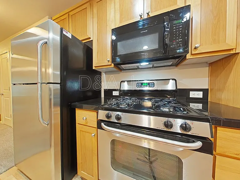 6298 SW Grand Oaks Dr #E104 — Photo 2