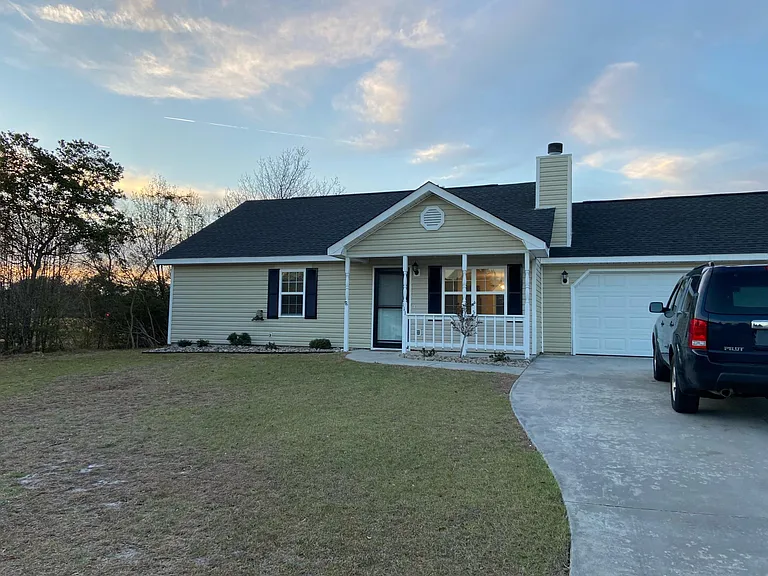 Front with Full 2 Car Garage