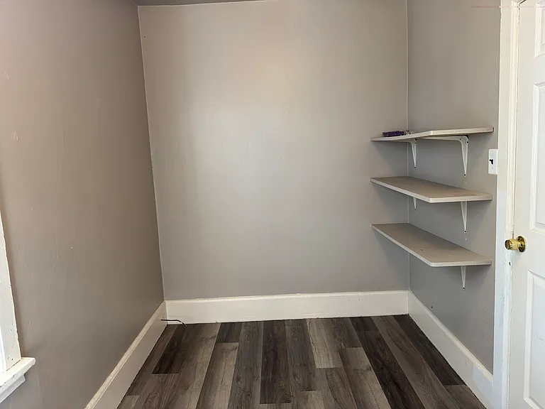 Primary bedroom washer/dryer closet.