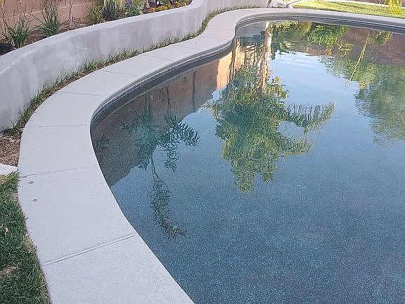 New concrete wall, palms,etc