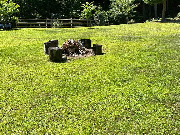 Large campfire area, by pavilion and summer kitchen
