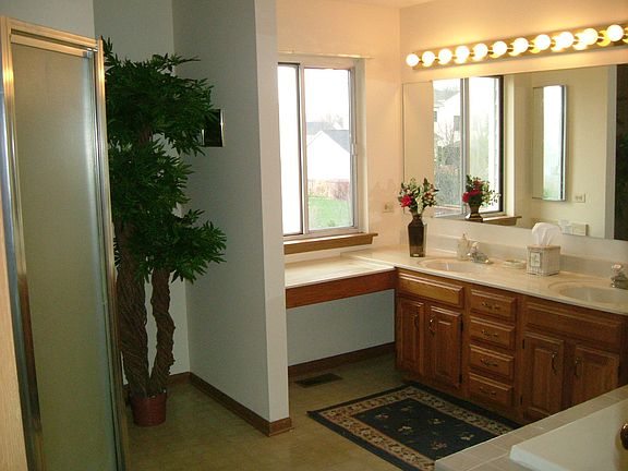 Huge Master Bathroom with tub and stand-in