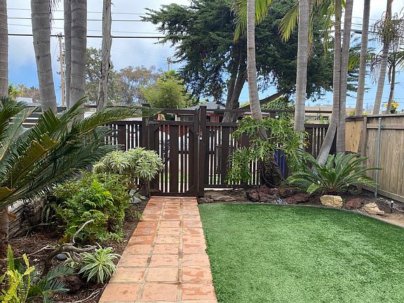 View of front yard, from front door, looking toward the street.