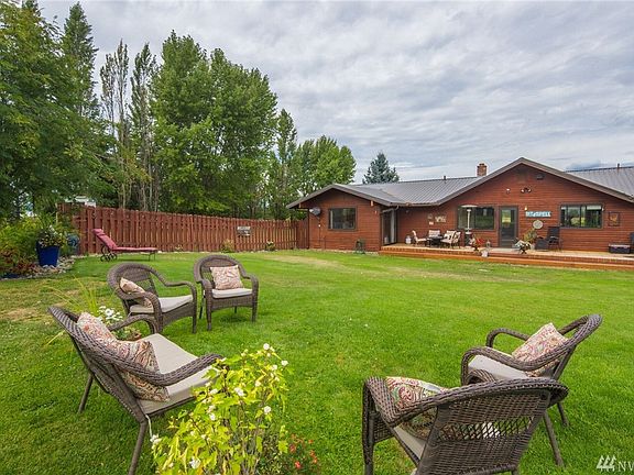 Lush back yard and large deck. 