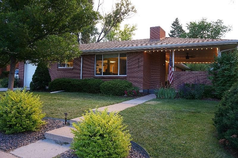 Front door with inviting side covered patio