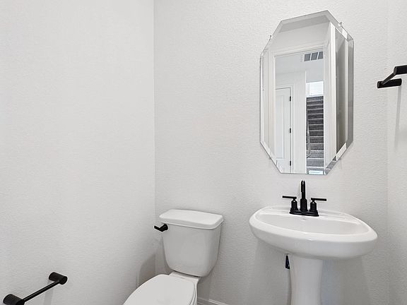 Powder room. Note Sample product photo - actual exterior and interior selections may vary by homesi