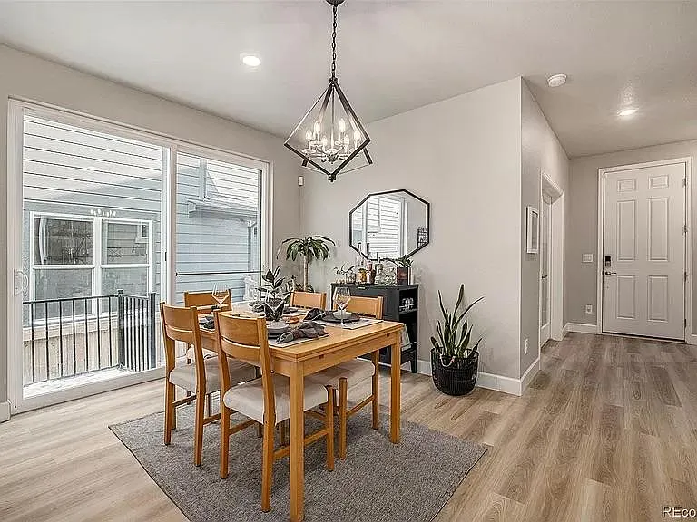 Dedicated dining space with access to side yard.