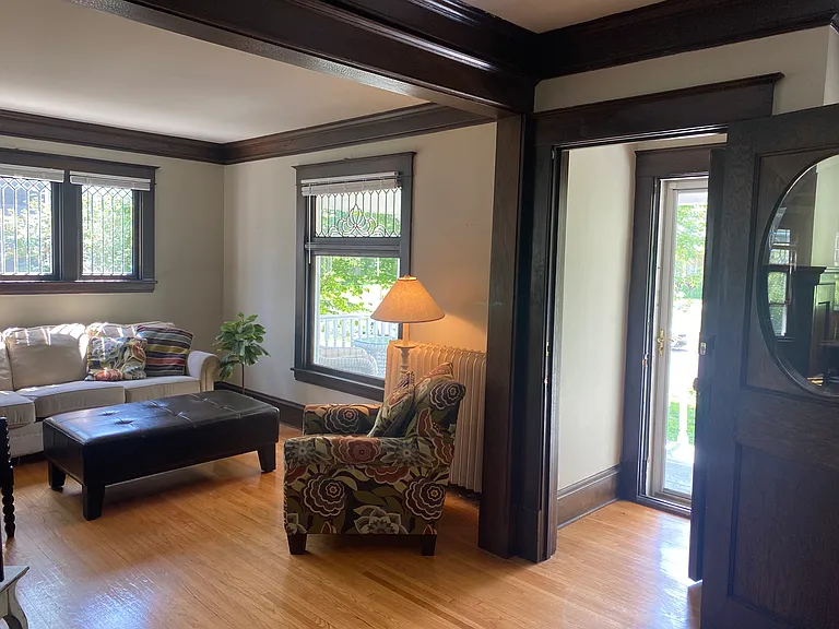 Entrance foyer leading to drop zone and light filled living room.