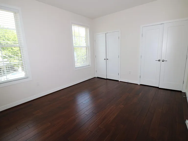 Second bedroom -- includes two large closets and direct/ensuite access to the second full bathroom