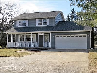 Front of home features large porch measuring 8'x23'