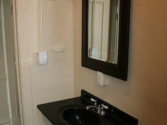 Opposite view of bathroom with window behind