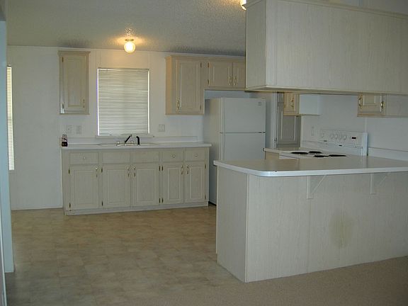 Kitchen is off the Living Room