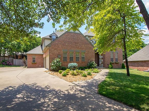 Broad shaded drive.  Lots of space for parking or play!