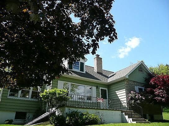 Updated Cape on Over Half Acre