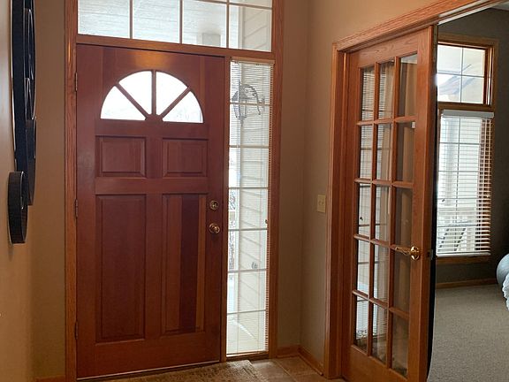 Foyer with french doors leading to office (can be used as extra room)
