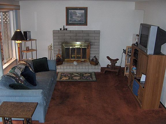 Cozy family room w/brick fireplace