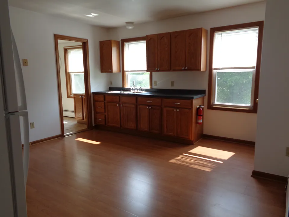 Sunny Large Eat-in-Kitchen with plenty of cabinets for your needs. Large pantry closet as well. Freshly painted last year. No additional wall mounted shelves/rods/hooks allowed.