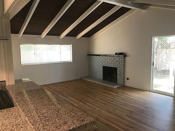 Family room with fireplace.