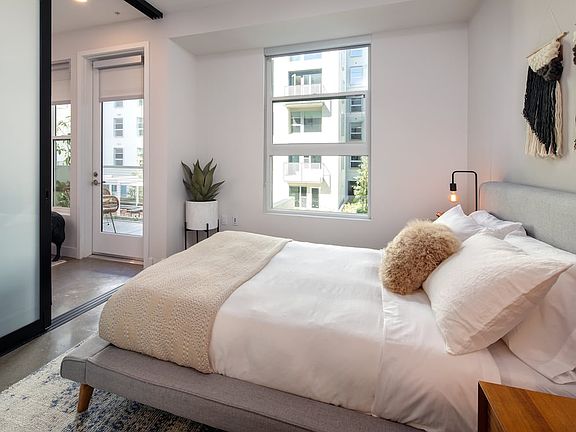 Bedroom with sliding barn door