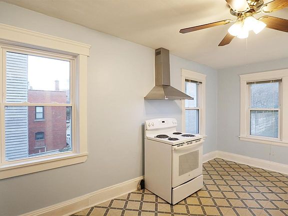Range with hood in kitchen