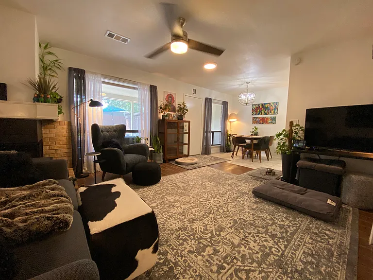 Living/Dining Combo room with large windows.