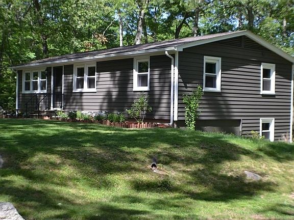 Side view featuring all new windows from October 2017 and high-end vinyl siding