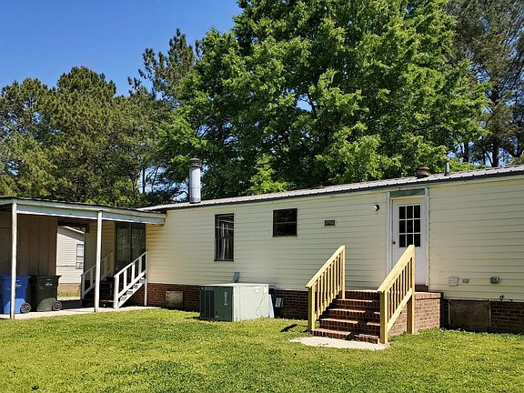 Rear Entrance and Storage Building