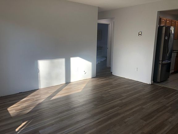 New flooring in living room, hallway and both bedrooms.