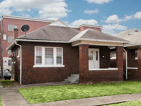Front of house with porch on Eutropia Court