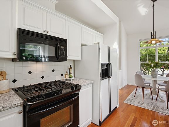 5th image of 9756 Capewind Lane NW