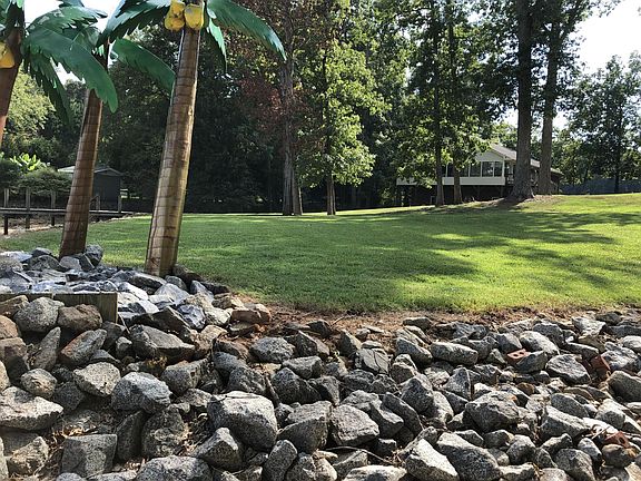 Front of house and yard from lake