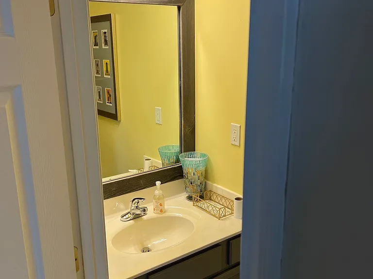 Main level half bathroom.