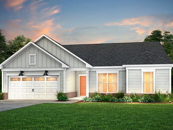 Amberwood Exterior 11 features siding, brick covered front door and 2 car garage