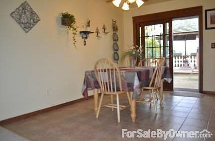 Ceramic tile
						:
						Dining room, + patio doors to deck with lighted gazebo for those quiet evenings